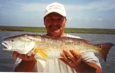 Mitch Mcbride with a nice Redfish - May