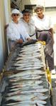 Mrs. T.S. Clements with friends - limits of surf trout 20 to 25 inchs - Girls against the Guys ( Girls won)